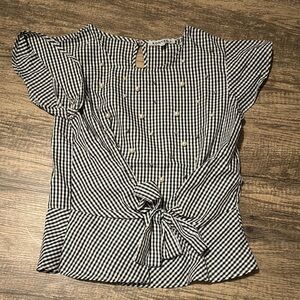 Black and white blouse with pearls